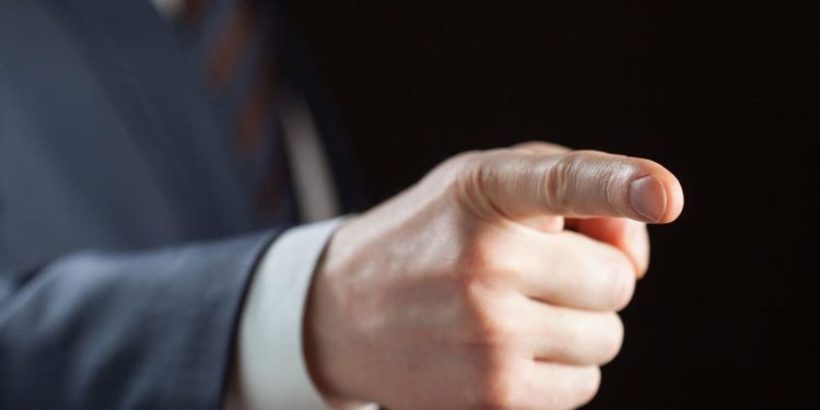 An Economic Perspective on Accusing Political Opponents of Racism