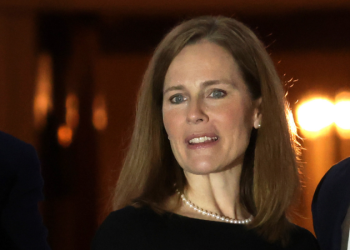 Barrett says justices ‘wear black, not red or blue’ in response to partisan critics in Fox News interview