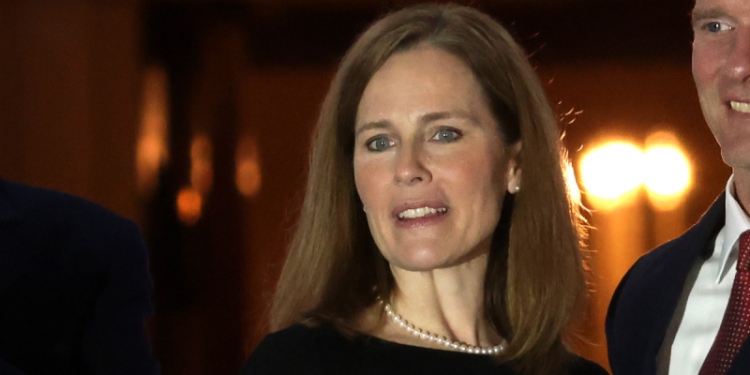 Barrett says justices ‘wear black, not red or blue’ in response to partisan critics in Fox News interview